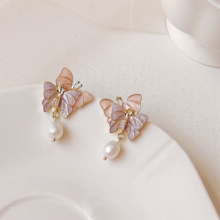 Wholesale 14k Gold Plated Enamel Double Butterfly Earrings with Freshwater Pearl Drops (5 Pairs) - A pair of 14k gold plated enamel double butterfly earrings with delicate freshwater pearl drops, shown against a clean white background.