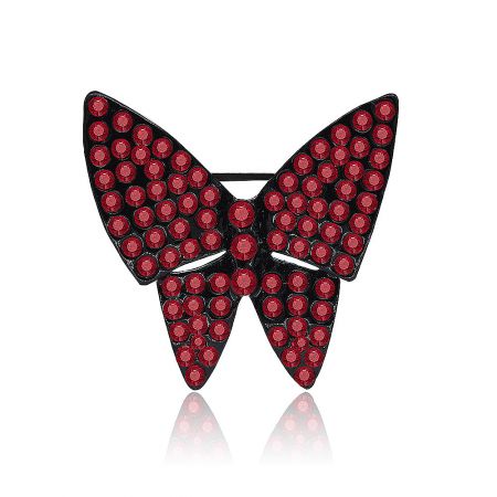 Black Red Butterfly Brooch Vintage - Close-up of the vintage black and red butterfly brooch, highlighting the detailed japanned metal framework and sparkling red crystal accents.