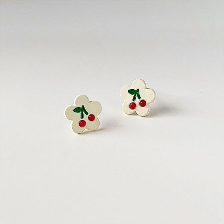 Full set of the flower-shaped earrings with cherry designs against a white background.