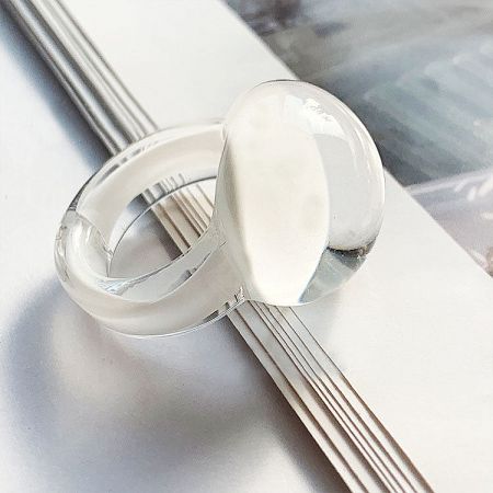 Two clear glass dome rings showcasing their transparent quality.