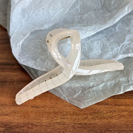 Clear acetate hair jaw clip with French design.