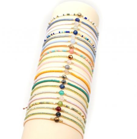 A display of various colorful faceted bead strand bracelets, highlighting the different patterns and color combinations available.