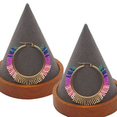 Beaded Hoop Earrings - A pair of gold hoop earrings with vibrant, multicolored beaded fringe from the JR Fashion Accessories summer collection, displayed on stands.
