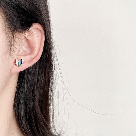 A different pair of rainbow enamel heart stud earrings from the 5-pair set.