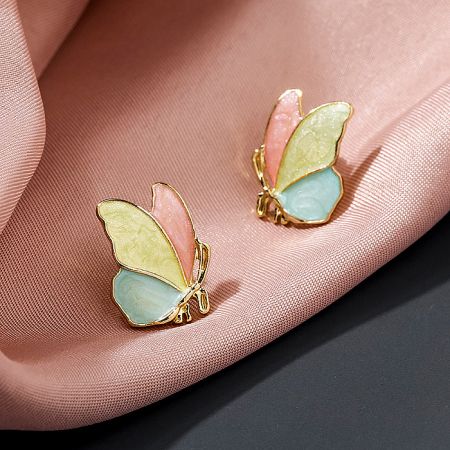 Another angle of the multi-colored butterfly stud earrings, emphasizing the detailed enamel work.