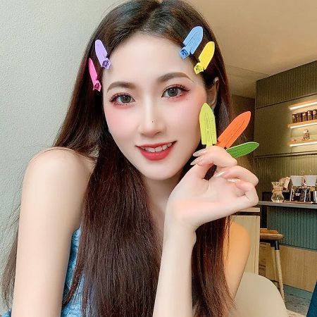 A woman with colorful butterfly-style hair clips, highlighting their decorative appeal.