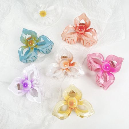 Large 8cm Plastic Frangipani Hawaiian Plumeria Flower Hair Claw Clips (5 pcs) - A collection of six large 8cm frangipani (plumeria) flower hair claw clips in various vibrant colors, arranged on a white background.