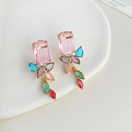 Elegant floral design earrings with colorful gemstones.