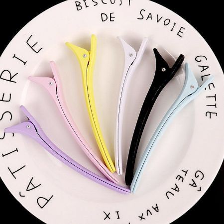 Vibrant hair clips presented on a decorative plate, highlighting their stylish appeal.