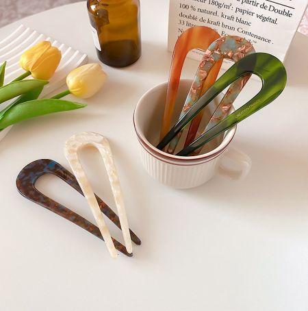 Wholesale U-Shaped French Style Hair Pin - A vibrant collection of U-shaped French style hair pins, model JRA-042, displayed in various colors. Offered for wholesale by JR Fashion Accessories.