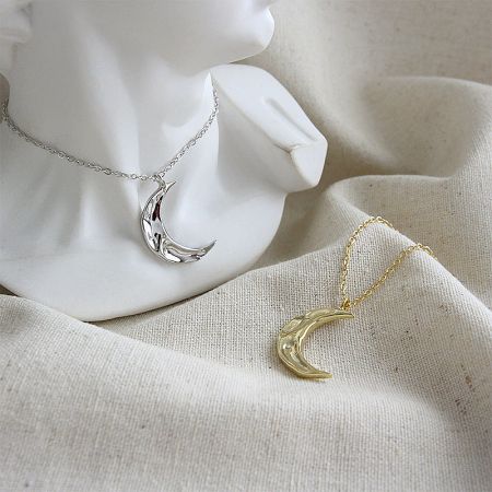 Waxing Crescent Moon Pendant Wholesale 925 Silver Minimalist Jewelry Necklace - Minimalist 925 sterling silver crescent moon necklaces in both silver and 18K gold plated finishes, displayed for wholesale.