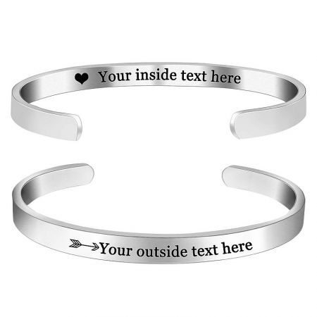 Personalized and Engraved Stainless Steel Bangle Bracelet - A polished silver stainless steel bangle bracelet by JR Fashion Accessories, showcasing custom engraving options for personalization.