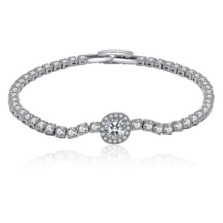 Round 2MM CZ Silver Tennis Bracelet - Close-up of the Round 2MM CZ Silver Tennis Bracelet, showcasing the central large cubic zirconia stone surrounded by smaller stones in a silver-toned setting.