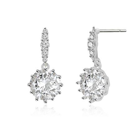 A pair of round prong setting dangle earrings with brilliant cubic zirconia stones in silver settings.