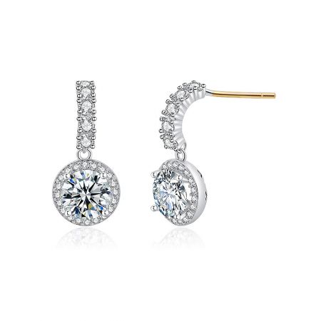 Close-up detail of the cubic zirconia earrings, highlighting the brilliant cut of the stones and the secure gold-toned post.