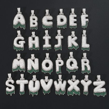 A full set of custom iced out alphabet pendants from A to Z, showcasing the range of customization.