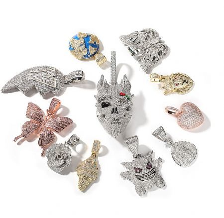 An assortment of custom hip hop pendants featuring various shapes and brilliant diamond settings.