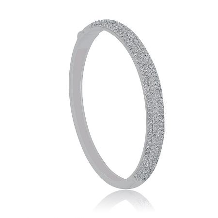 Clear Round Cubic Zirconia Oval Pave Bangle - Close-up view of the Clear Round Cubic Zirconia Oval Pave Bangle, showcasing the rows of sparkling stones on its rhodium-plated surface.