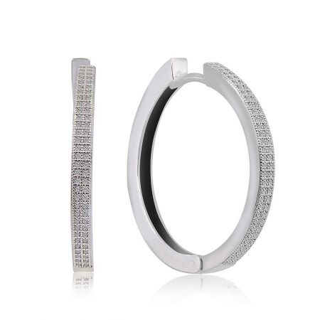 A detailed angle of the large CZ hoop earrings, showing the encrusted cubic zirconia stones.