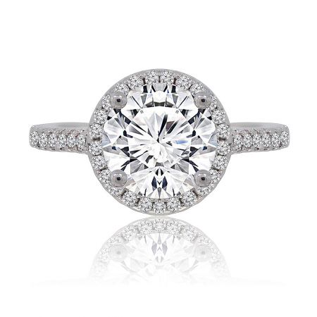 Unique Forever Engaged Ring - A close-up of the Unique Forever Engaged Ring, showcasing a brilliant 8mm round cubic zirconia center stone surrounded by a sparkling halo, set on a rhodium-plated brass band.