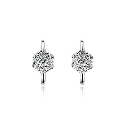 Floral Clear CZ Huggie Earrings - A close-up of the Floral Clear CZ Huggie Earrings, showcasing the intricate cubic zirconia flower design on the rhodium-plated hoop.