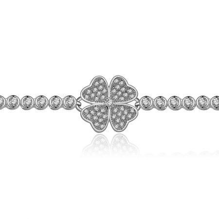 Detailed view of the Clover Charms bracelet, highlighting the four-leaf clover centerpiece and the circular links, all adorned with small, sparkling stones.