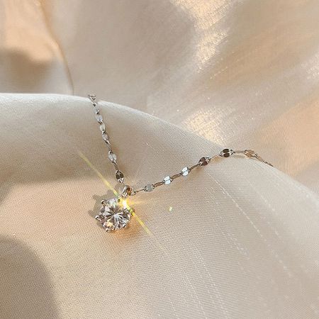 925 Sterling Silver Classic Six-Claw Zircon Necklace Set of 5 - Close-up of a 925 sterling silver necklace with a classic six-claw zircon pendant on a neutral background.