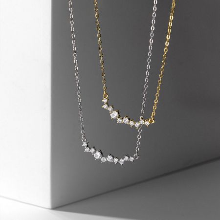 925 Smile Cubic Zirconia Choker Necklace Set of 5 - A set of 925 sterling silver smile choker necklaces with cubic zirconia, shown in both gold and silver finishes on a neutral background.