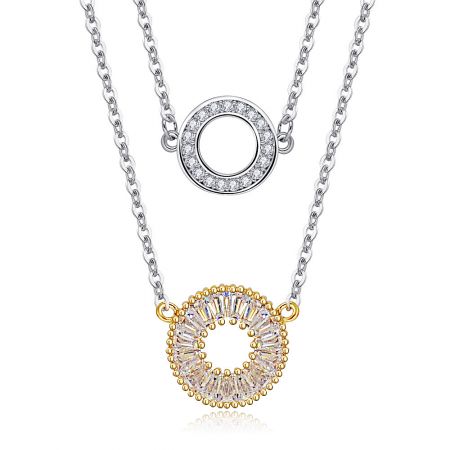 Close-up view of the two-tone CZ circle drop necklace in silver and gold plating.