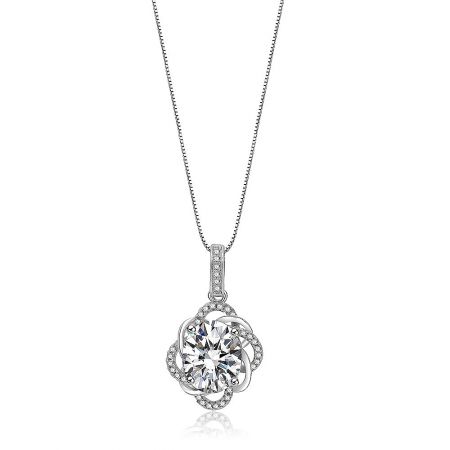 Glistening Pendant - Close-up of the Glistening Pendant necklace, showcasing its rhodium-plated finish and a central cubic zirconia stone surrounded by smaller stones in a floral design.