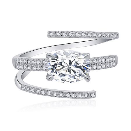 Spiral Line Oval CZ Ring - A close-up product shot of the Spiral Line Oval CZ Ring, featuring a large oval cubic zirconia stone set on a rhodium-plated brass band with smaller pave stones.