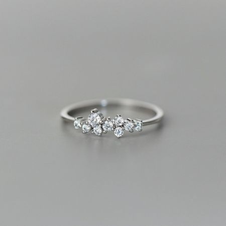 Detailed view of the sterling silver starry dot ring.