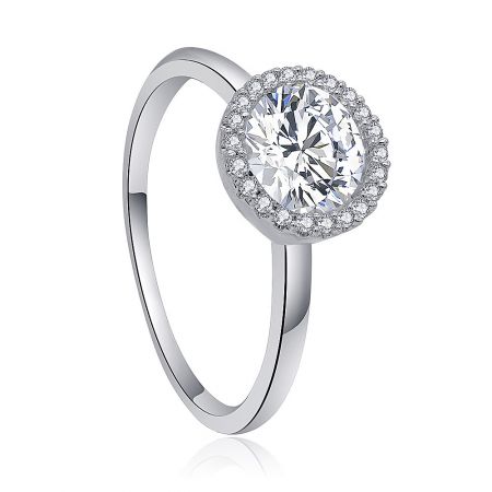 Angled view of the White CZ Solitaire Ring, showcasing the delicate band and the sparkle of the halo-set stones.