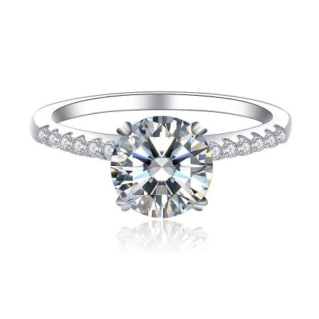 Round CZ Engagement Ring - A stunning Round CZ Engagement Ring featuring a large round-cut cubic zirconia centerpiece in a four-prong setting on a rhodium-plated brass band with side stone accents.