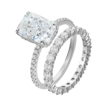 Side-by-side view of the silver engagement ring and eternity band.