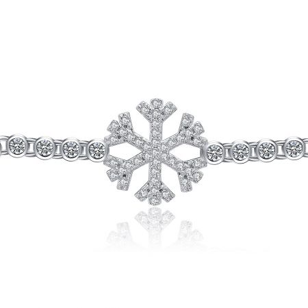 The Snowflake Tennis Bracelet displayed in its full length, showing the pattern of snowflake and bezel-set diamond links.