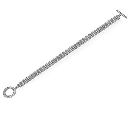 Detailed shot of the brilliant princess-cut cubic zirconia stones set in three rows on the brass bracelet.