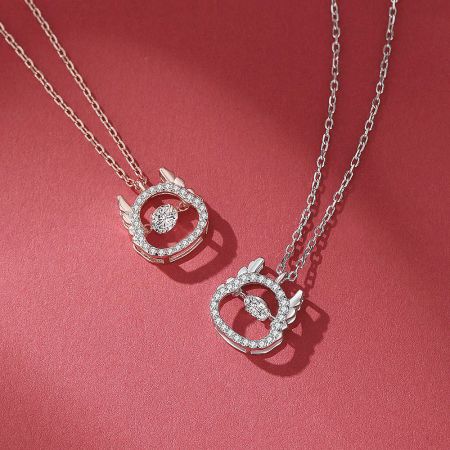 Detailed view of the silver Year of the Dragon necklace, highlighting the intricate design and sparkling CZ stone.