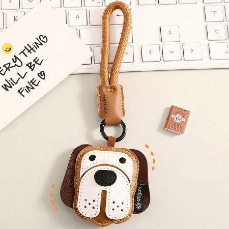 Front view of the black Bulldog leather keychain showing its cute expression.