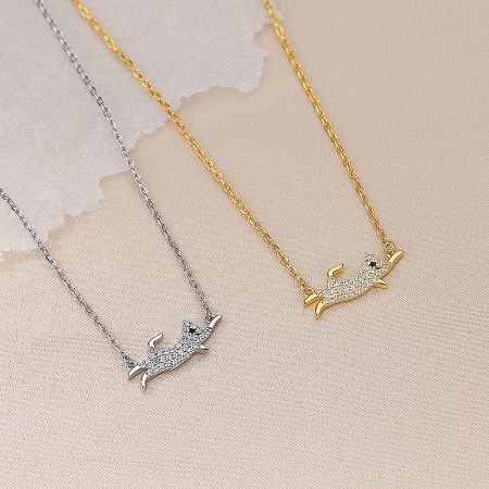 925 Silver Cubic Zirconia Dog Pendant Necklaces (Set of 5) - A pair of 925 sterling silver dog pendant necklaces, one in a silver finish and one in a gold finish, both adorned with sparkling cubic zirconia stones.