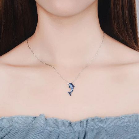 925 Sterling Silver Blue Zircon Dolphin Pendant Necklace (Set of 5) - A close-up of the 925 Sterling Silver Dolphin Pendant Necklace, showcasing the intricate blue and clear zircon stones on a silver chain.