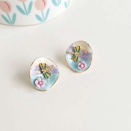 Wholesale Painting Style Gold Plated Gradient Enamel Dragonfly Stud Earrings (5 pairs) - A close-up of the wholesale painting-style gold plated dragonfly stud earrings, featuring a vibrant gradient enamel finish on a brass base. The design is nature-inspired.