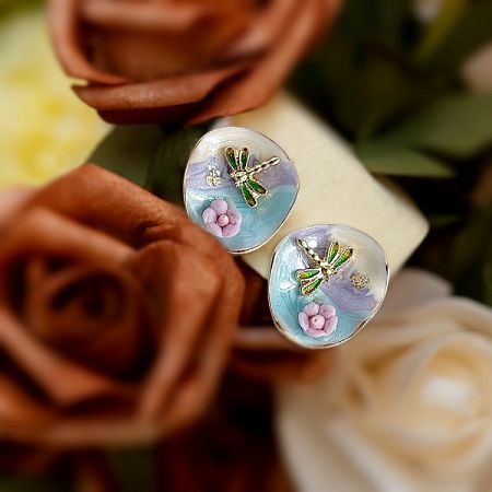 Another angle of the gold-plated dragonfly earrings, highlighting the gradient enamel colors.