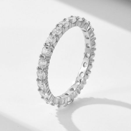 Close-up of the sparkling eternity band with round-cut cubic zirconia stones.