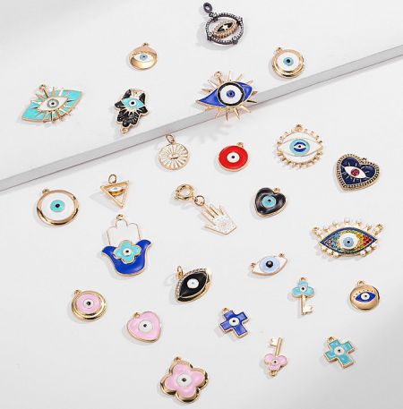 A diverse assortment of eye-themed charms and pendants for custom jewelry.