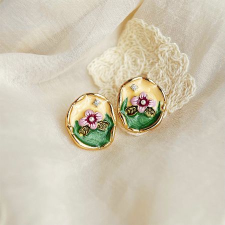 Flower Painting 14k Gold Plated Enamel Stud Earrings with Rhinestones and Pearl (Set of 5 Pairs) - A pair of 14k gold-plated floral stud earrings featuring delicate pink enamel flowers, green leaves, and accented with shimmering rhinestones and a central pearl.