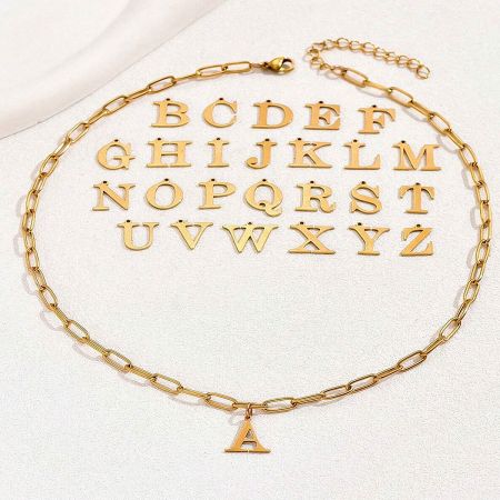 The customizable gold initial necklace displayed with multiple letter options.