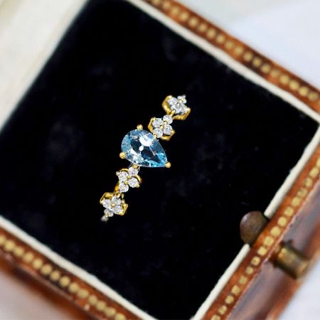 The sterling silver aquamarine ring presented in a luxurious leather gift box.