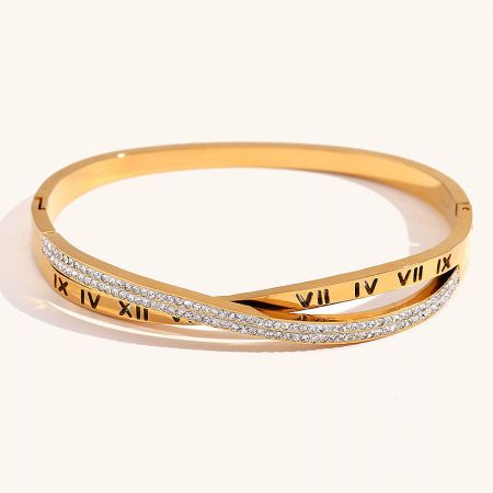 Detailed shot of the stainless steel gold cross Roman numeral bangle, showing the secure clasp mechanism.