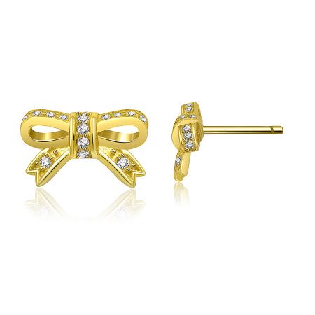 Detailed view of the gold bow stud earrings showcasing the cubic zirconia stones.